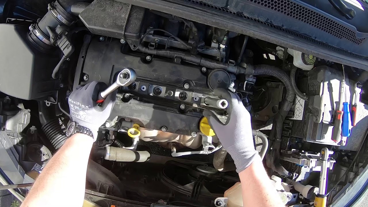 How to replace the spark plugs sparking Plug replacement Vauxhall Corsa E Mk4 DIY