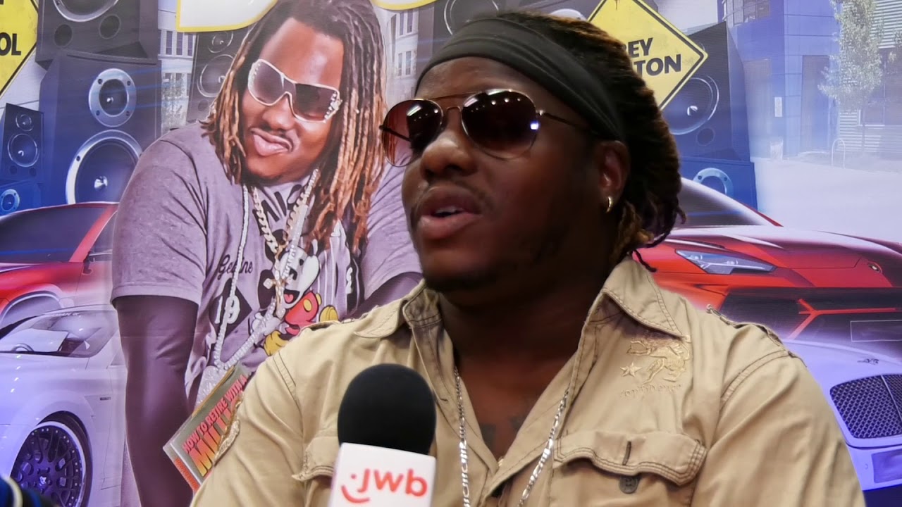 Kids scream 'Make Them Days Count!' with Corey Thornton at school attendance pep rally