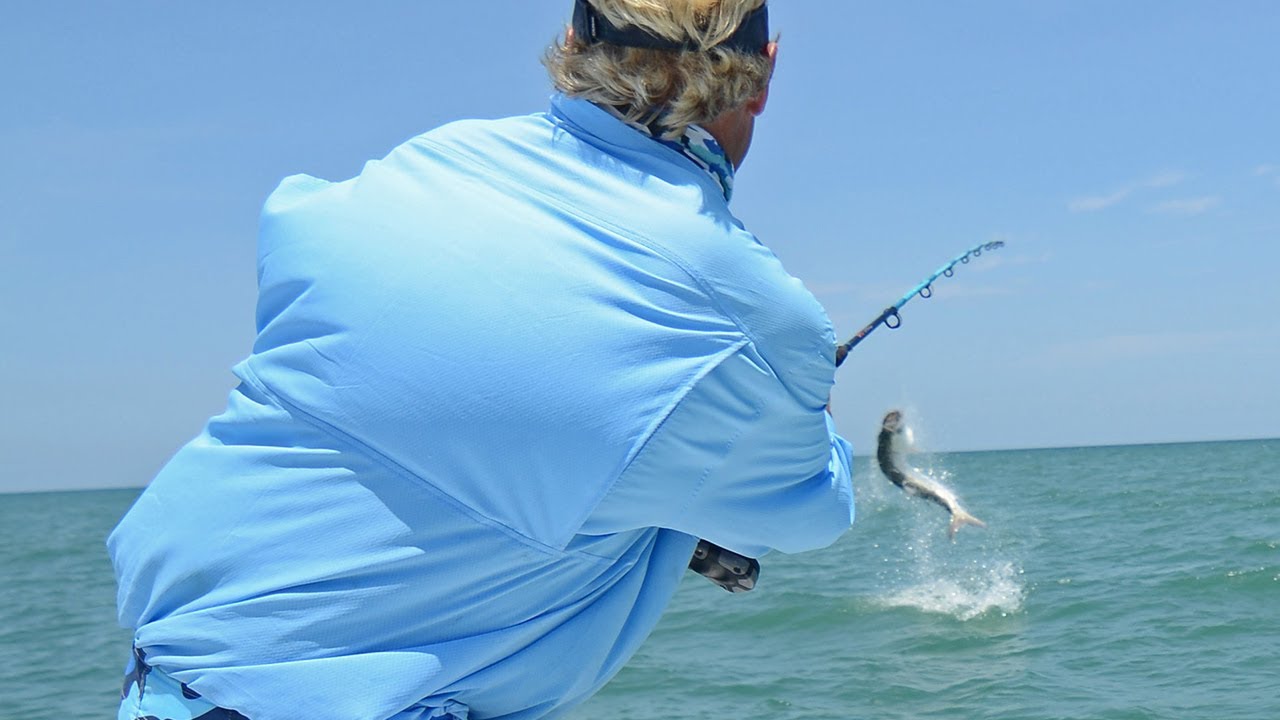 Beach Tarpon Fishing Tampa Bay on Light Tackle Popping Corks