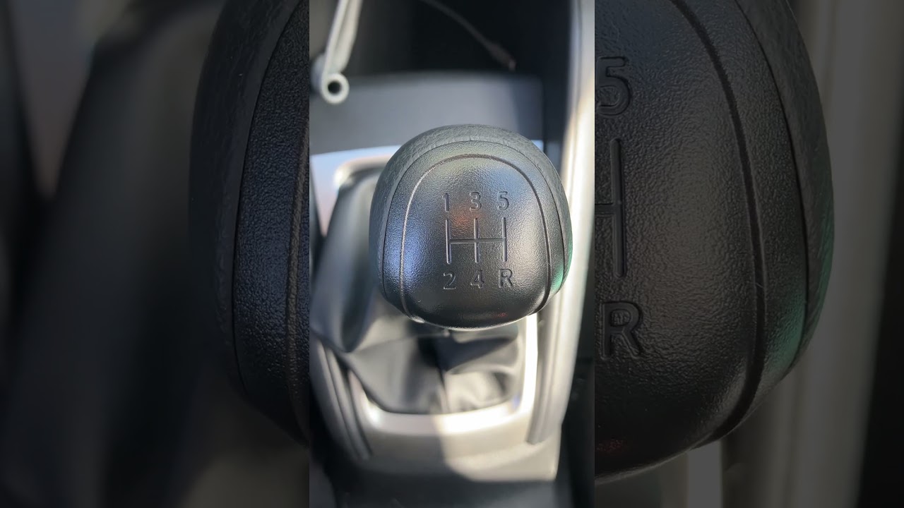 What the 2024 Nissan Versa S Manual Transmission stick shift looks like.