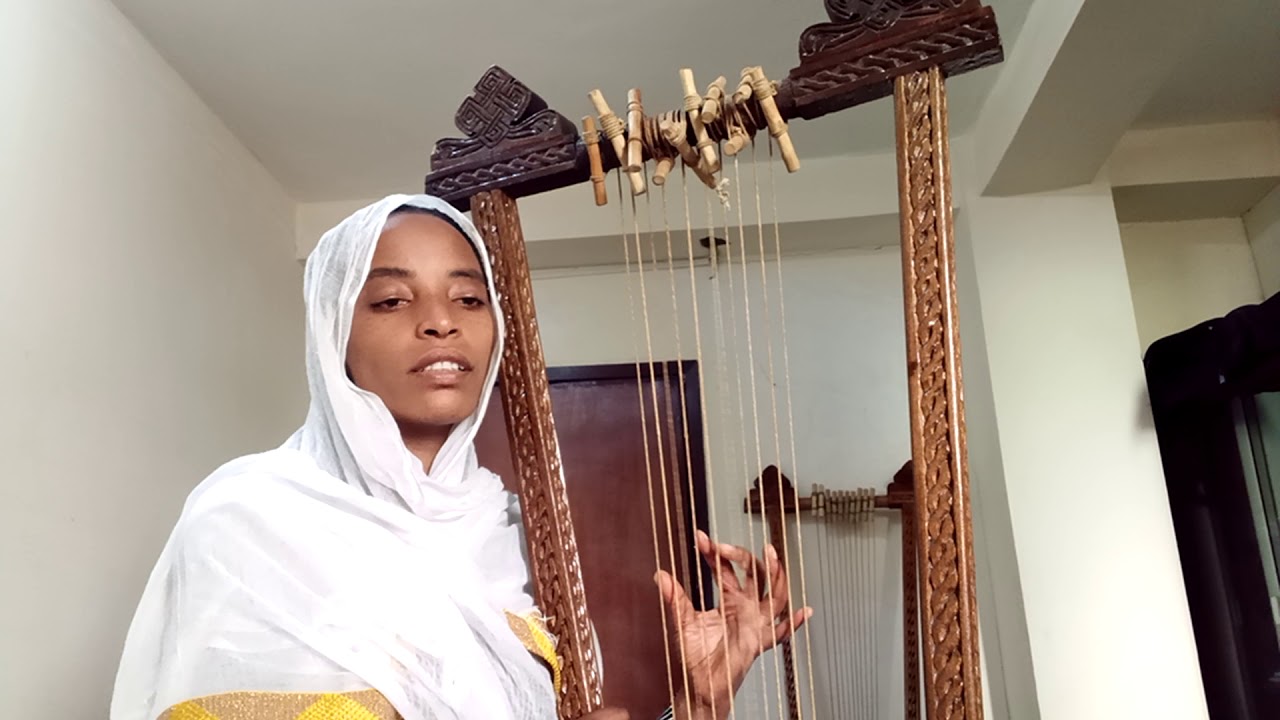 አዝላው ወረደች ወደ ግብጽ በበገና…. በሙሉእመቤት አወቀ … Azlaw Weredeche Wedegebetse .... Muluembet Awoke