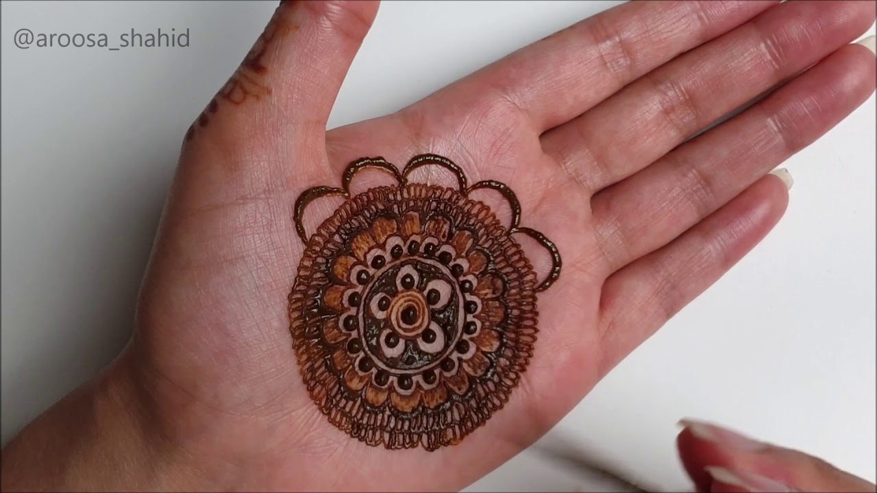 Simple Unique Mandala Mehendi design for front hand