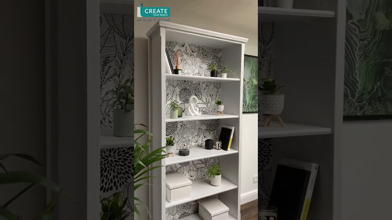 Bookcase makeover using peel and sick wallpaper
