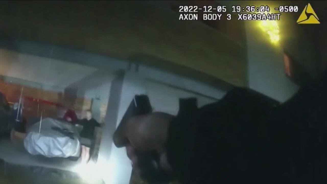 Video shows couple subdue burglar until police arrive
