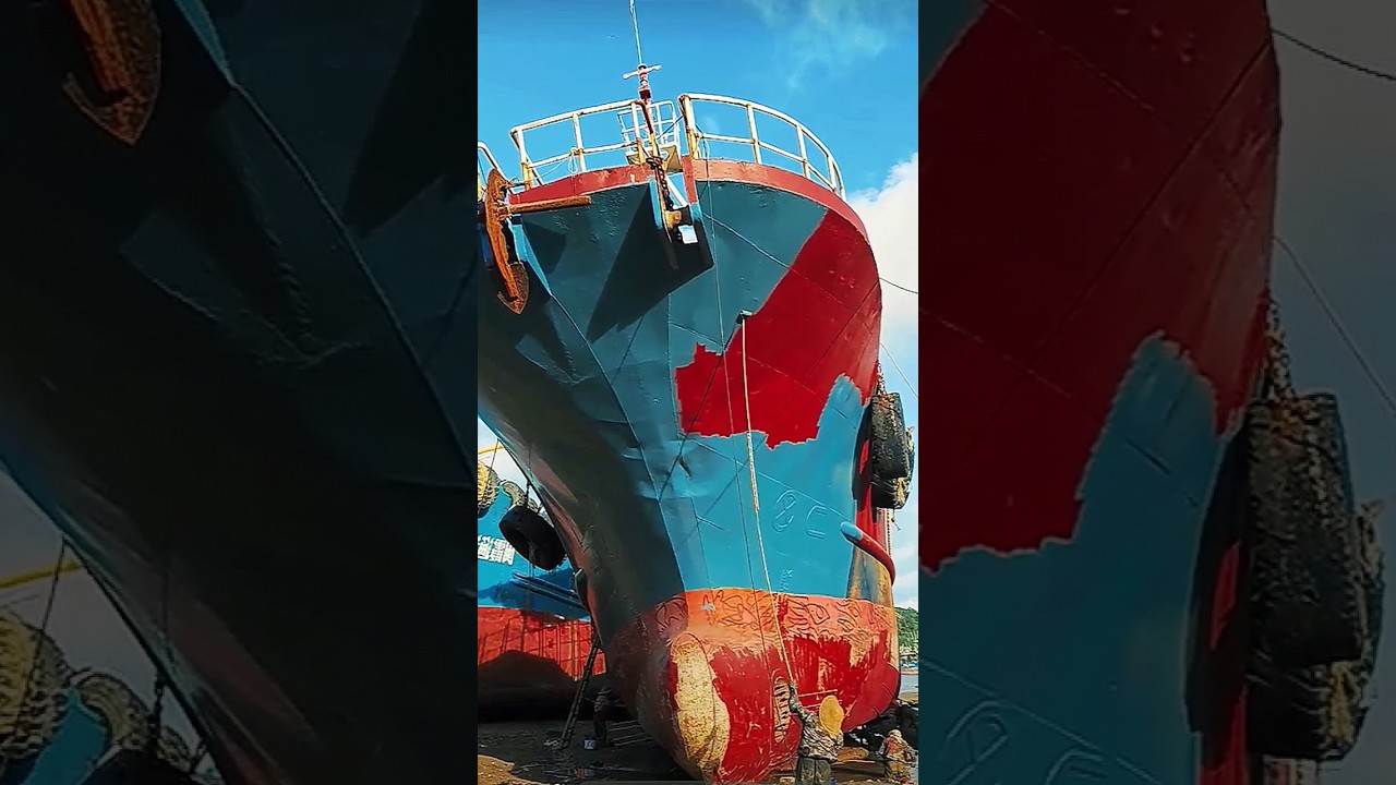 The process of restoration, painting the ship's side