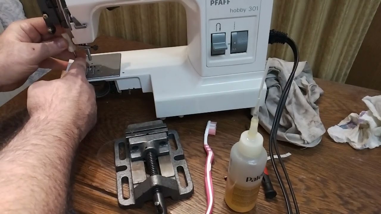 PFAFF Nähmaschine Modell hobby 301 {جزء7}{T.7} صيانة البلاطة وضبط المشط الماكينة الخياطة