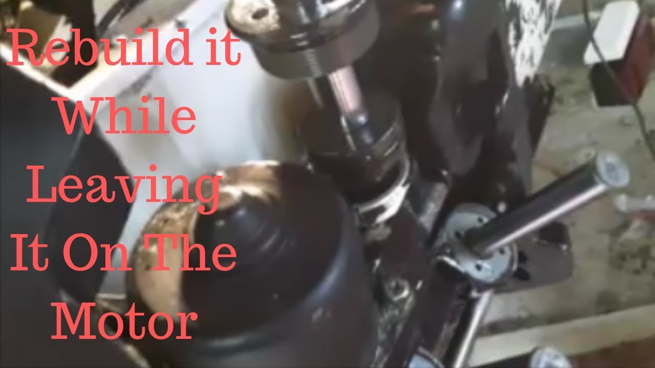 Rebuild Your Evinrude Power Trim Cylinder With it Still in the Motor Saddle