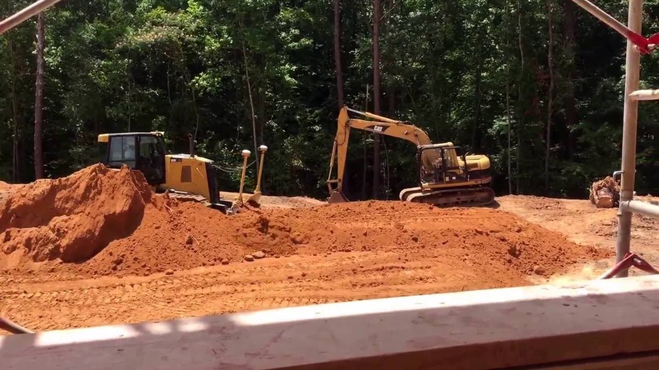 Cat D6K2 LGP grading for parking lot part 1