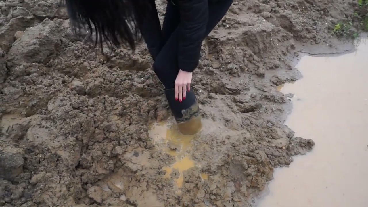 Girl in Riding Boots gets muddy