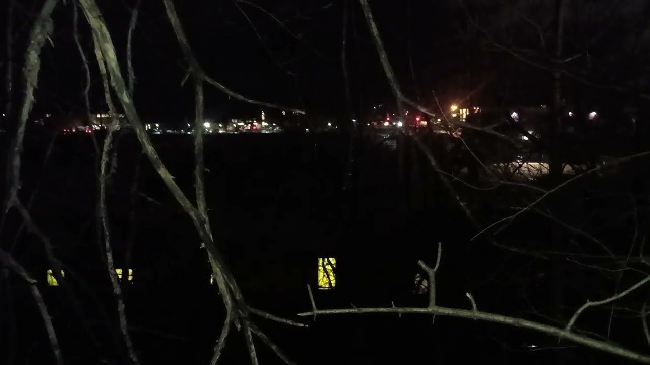Trains of 3/12/2026: Very Long Mixed Train Behind La Crosse Central High School in La Crosse WI 