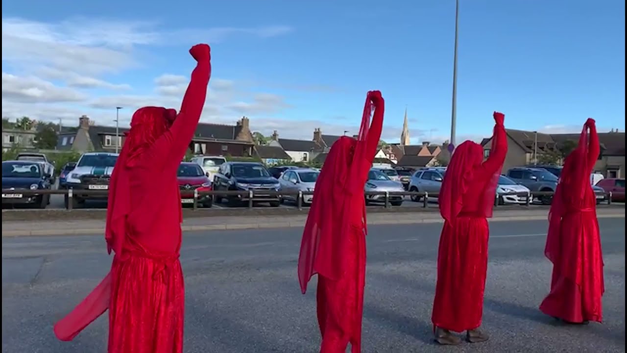 Red Rebels Brigade joins Extinction Rebellion at Highland oil rig maintenance facility
