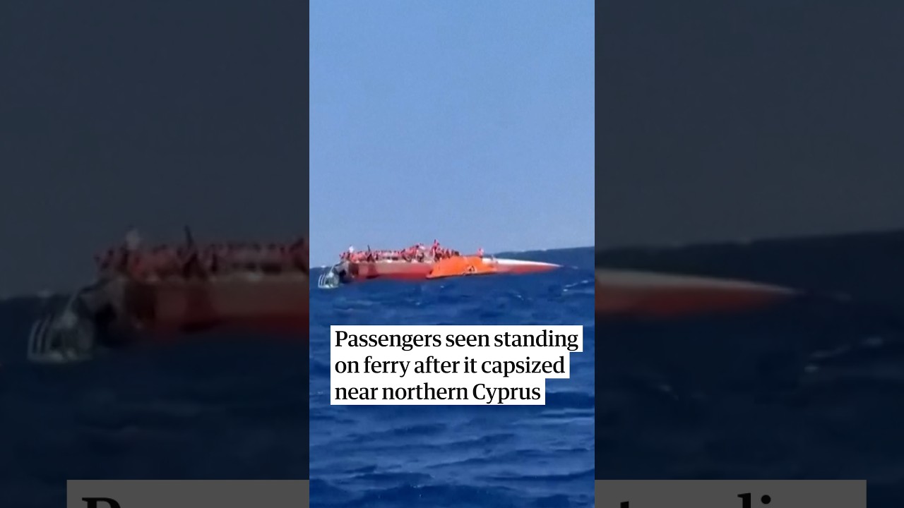 Passengers seen standing on ferry after it capsized near northern Cyprus