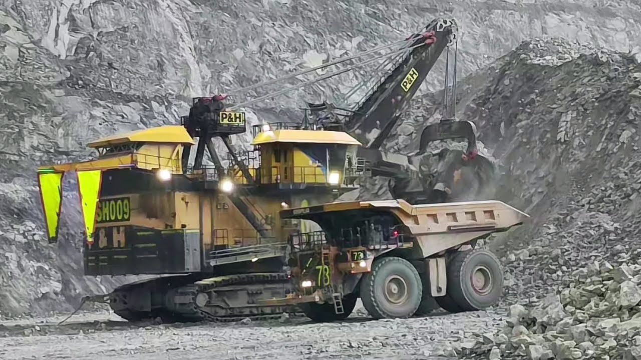 P&H 4100 XPC Big Shovel Loading Komatsu 980E & 930E Extraction Trucks - Copper Mining
