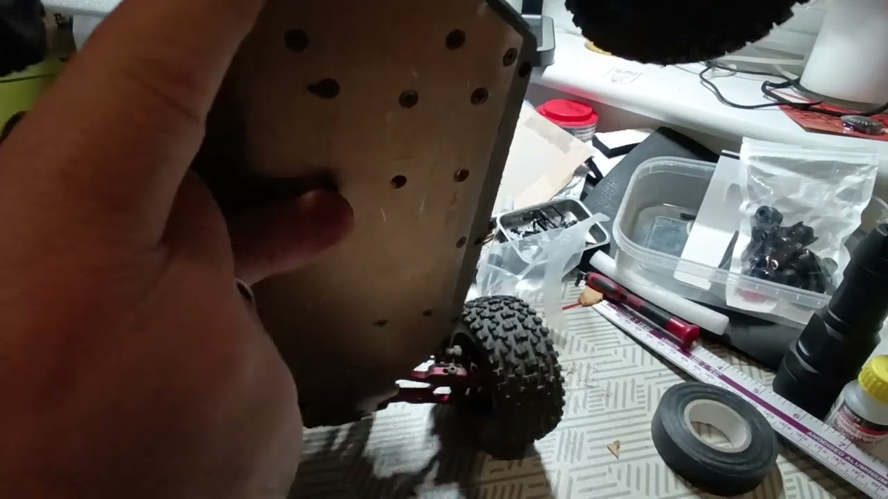 WLToys 124016 mods on a filthy work table