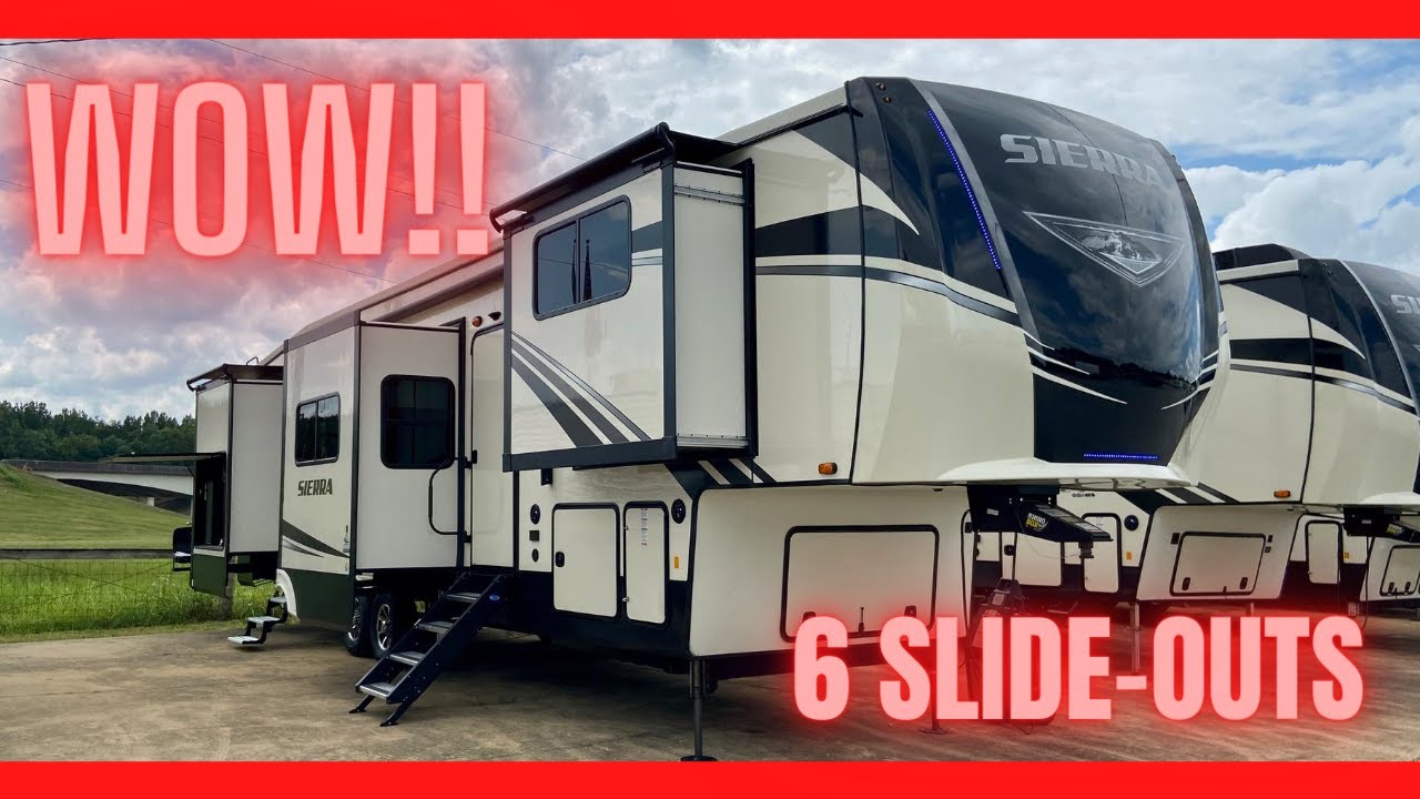 Crazy brand new 5th wheel camper with 6 slide-outs! This RV ROCKS! Camper Tour