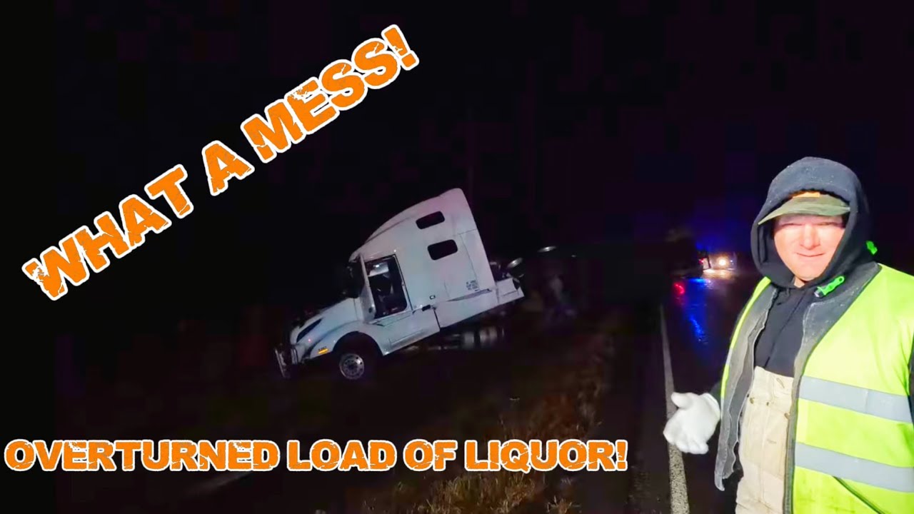 A TRACTOR TRAILER LOAD OF COFFEE LIQUOR TURNED OVER BLOCKING THE ROAD!!! WHAT A MESS!! 