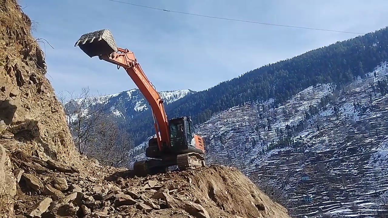 Tata Hitachi Excavator machine Road cutting work