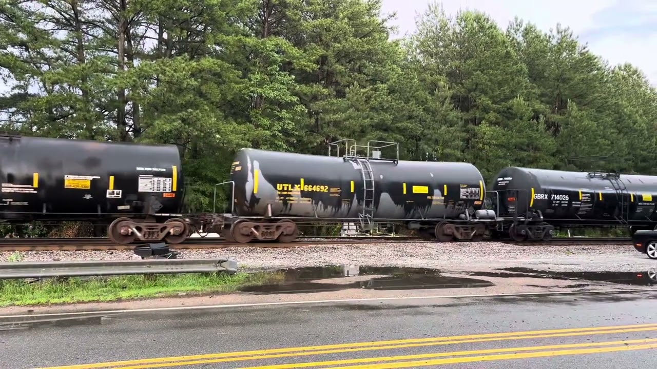 CSX M369 passing Petersburg yard with CSX 1776 and 4720 trailing! (for the upcoming military train)