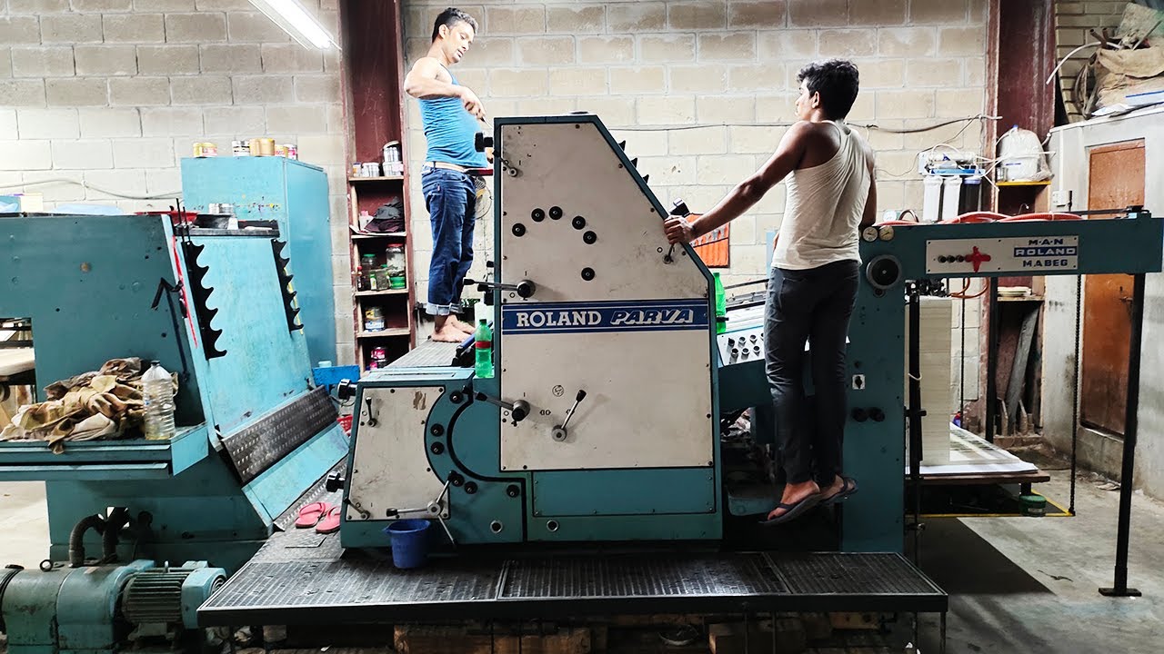 Printing Process with Two Color Roland PRAVA Printing Machine