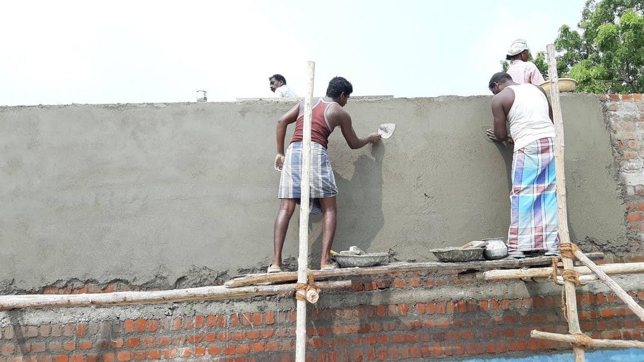 Amazing Construction-big wall plastering work with speed indian style-using by sand and cement mixer