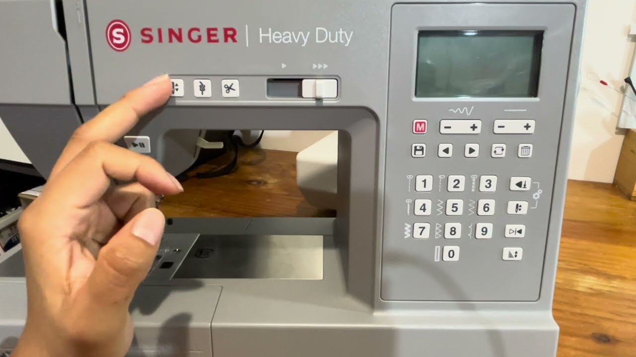 Singer heavy Duty- 6805C- puntadas y boton
