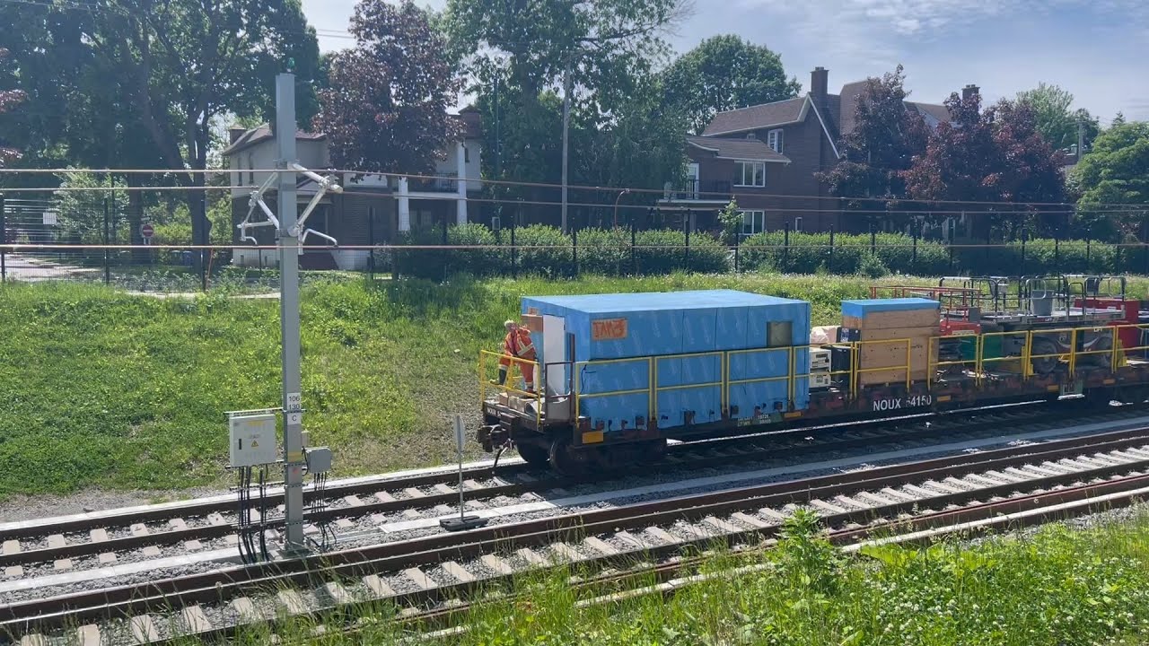 Montreal REM: Engineering Train Passes Ville-de-Mont-Royal Station