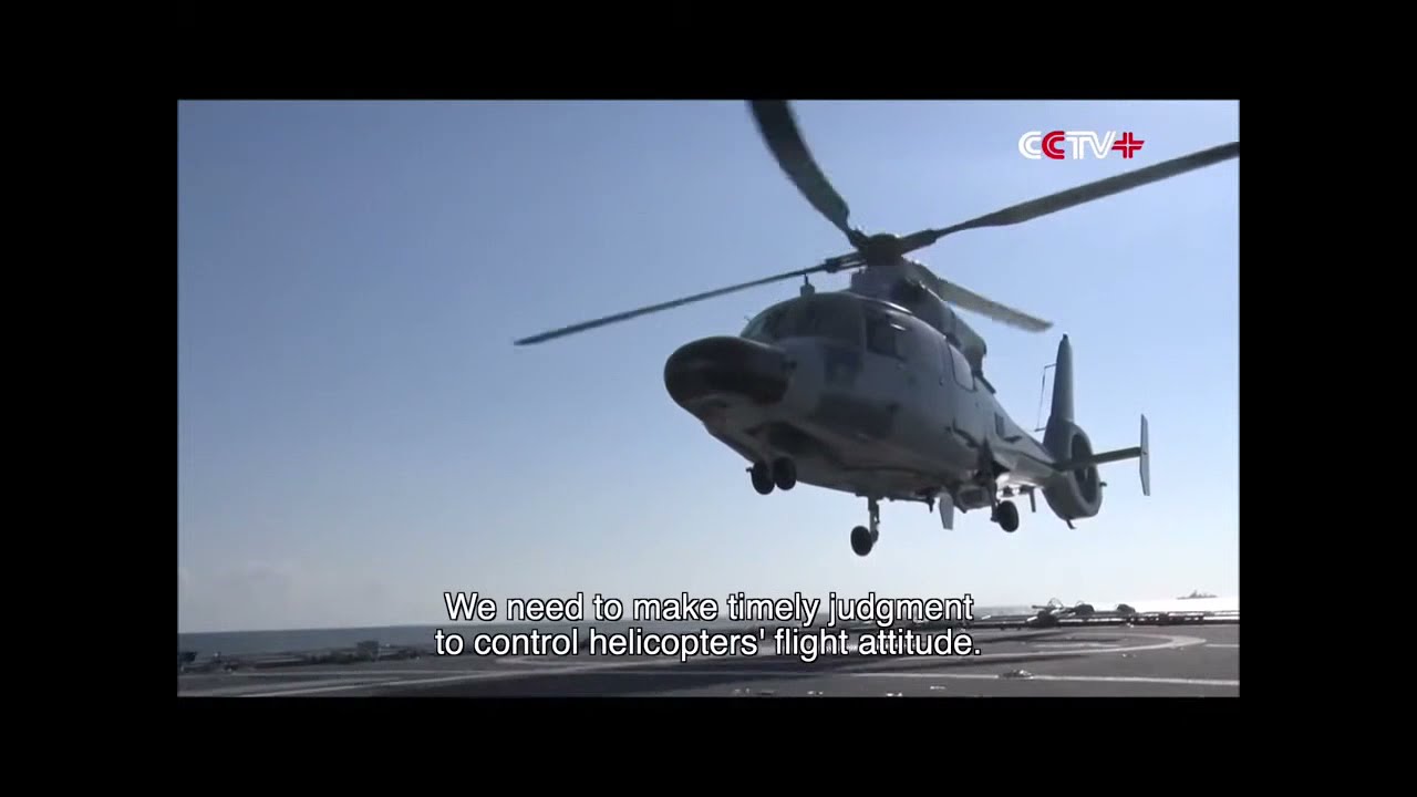 Chinese Navy PLAN Harbin Z-9C landing training with a Type 052D destroyer