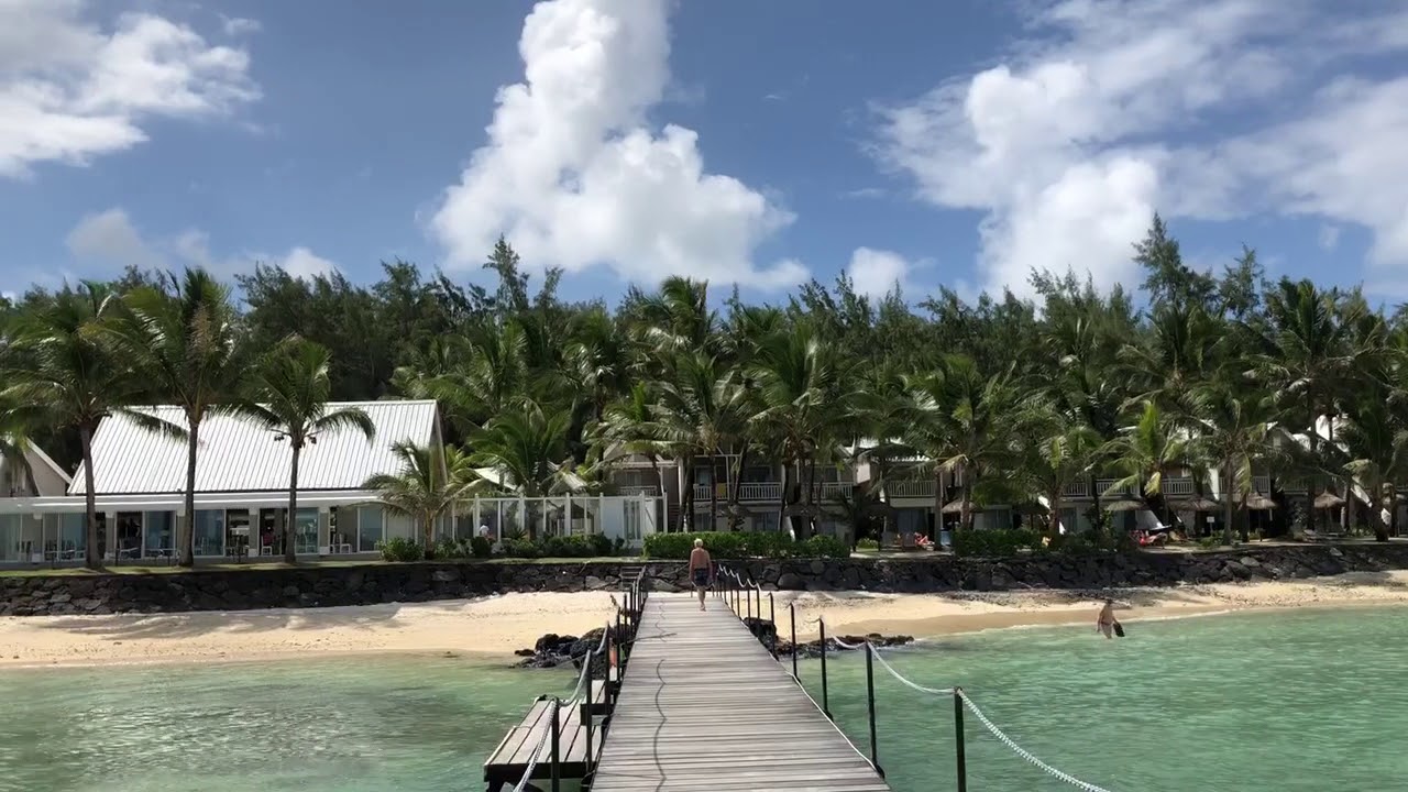 The Tropical Attitude Hotel in Trou D'eau Douce, Mauritius from the beach front pier on the lovely