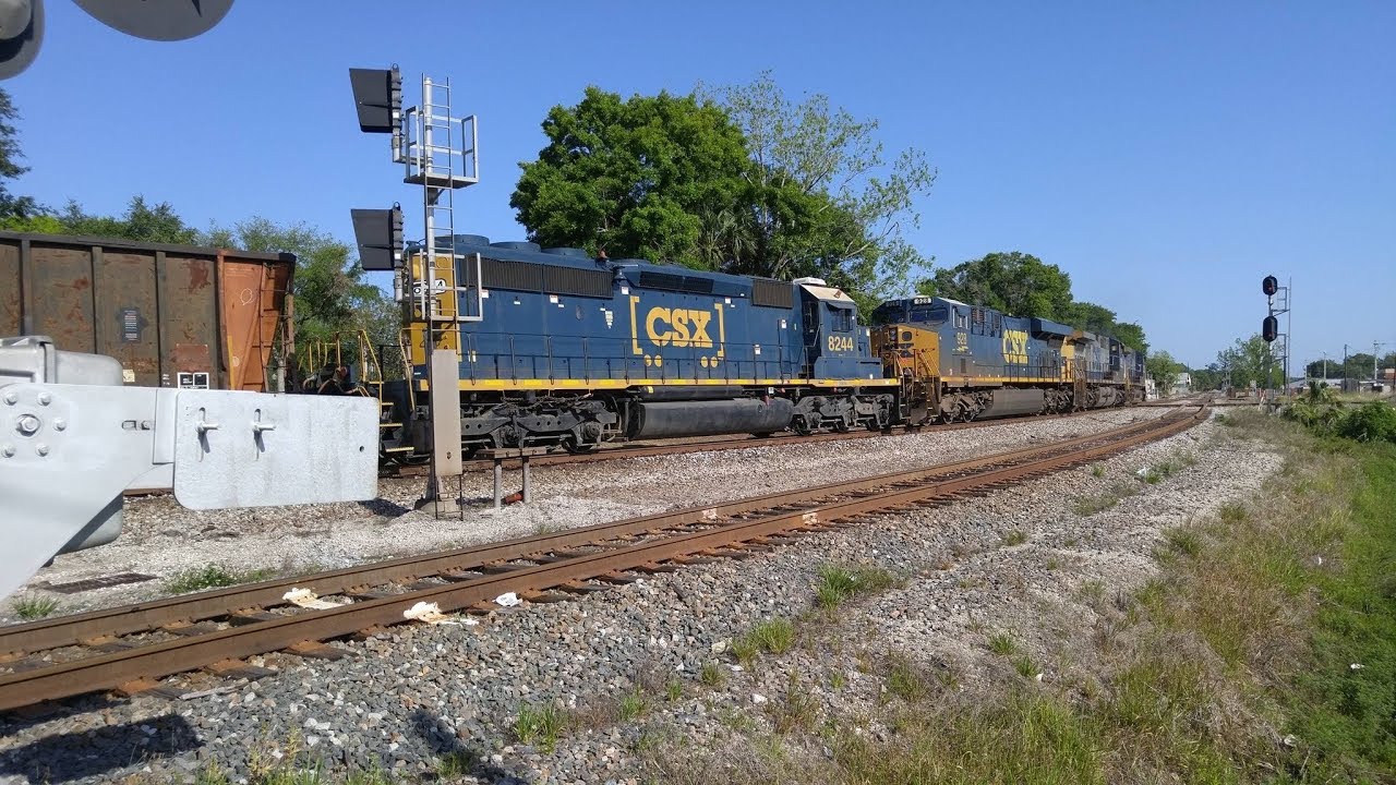 Csx pulls huge train through the curve in Plant city (Ft. Tommy4Trains)