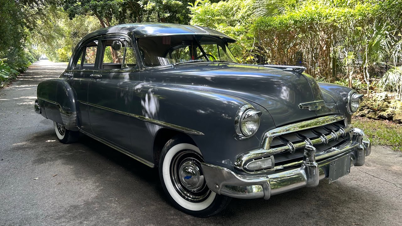 SOLD! one owner 1952 Chevy Deluxe with factory paint and many accessories from the 1950s