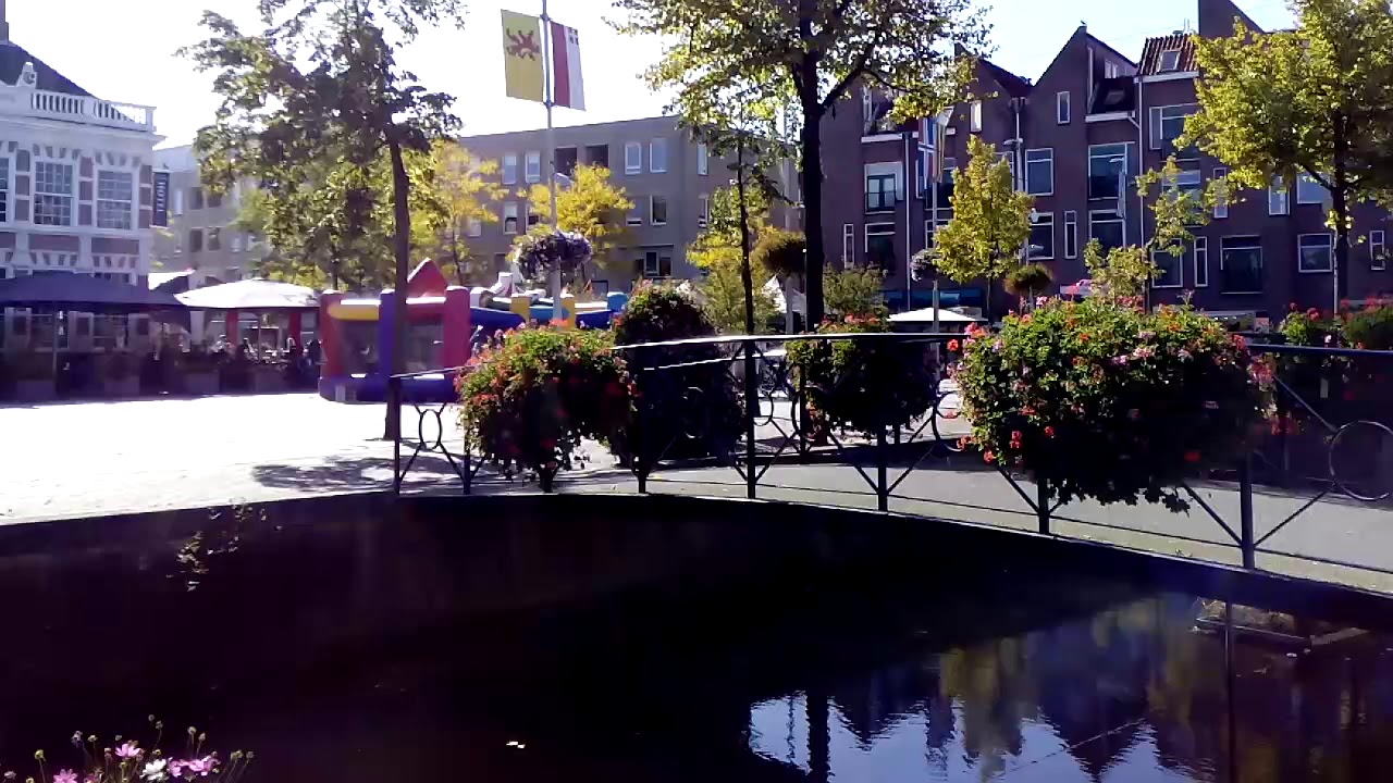 Dutch Water Channels...Flower shop effective advertising as small islands moving.