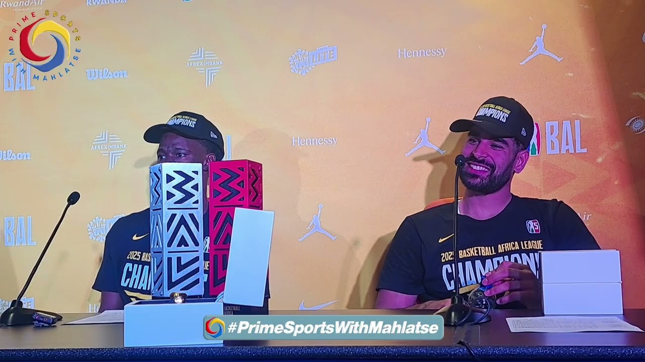 Al Ahli Tripoli players Mohamed Sadi and Jean Jacques Boissy after winning Basketball Africa League.