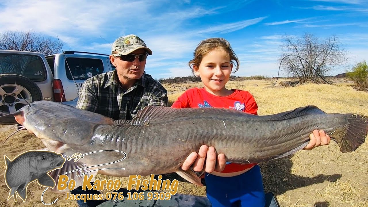 Stefanie and Coert catching catfish on the Orange river.