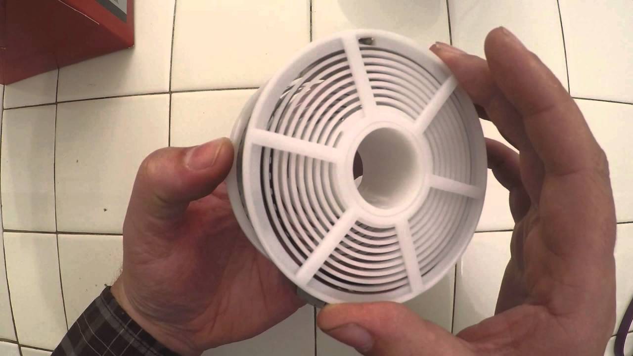 Loading Paterson developing tank film reel with 35mm film