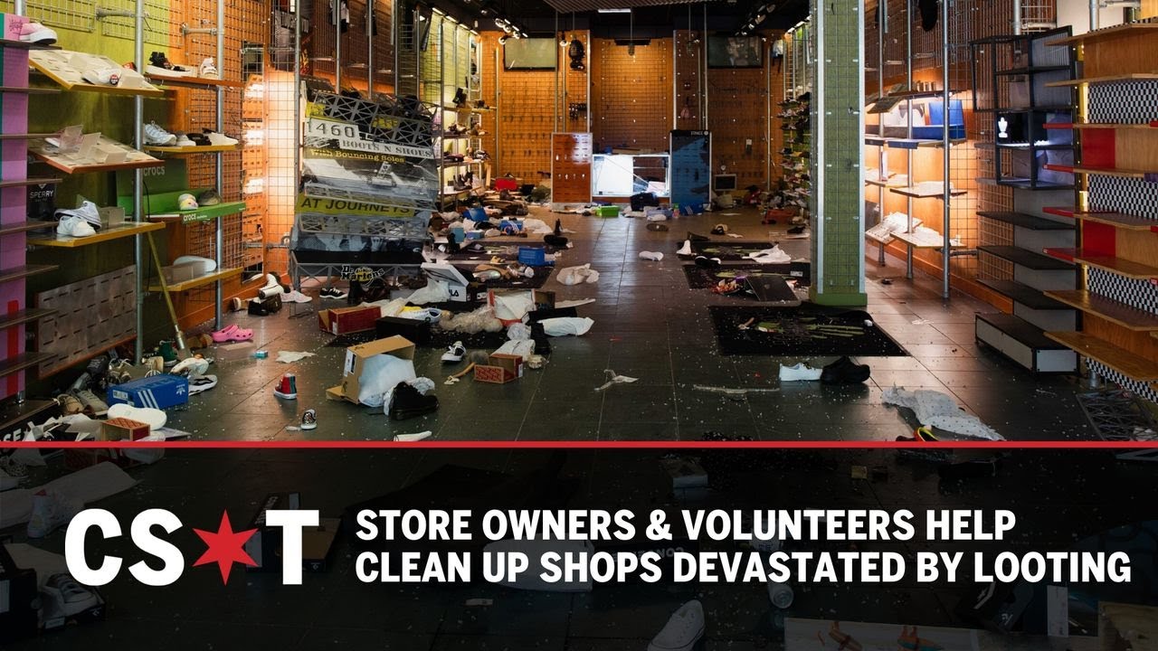 Store owners & volunteers aide in clean up of shops devastated by looting, vandalism