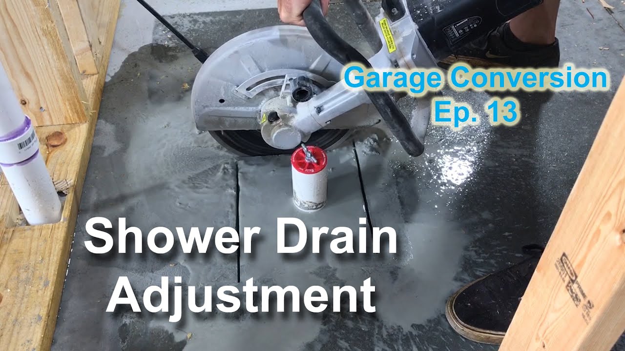 How to move a shower drain in concrete | Garage to Apartment Conversion | Episode 13