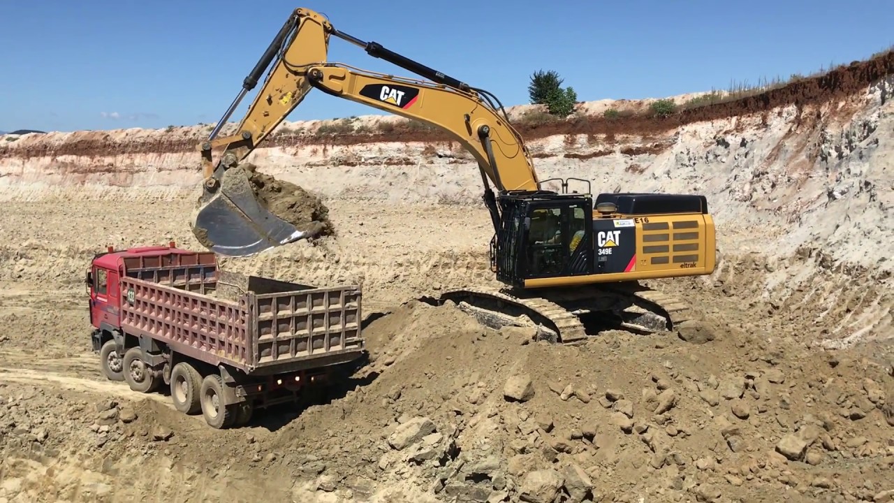 Caterpillar 349E Excavator Loading Trucks With 4 Passes
