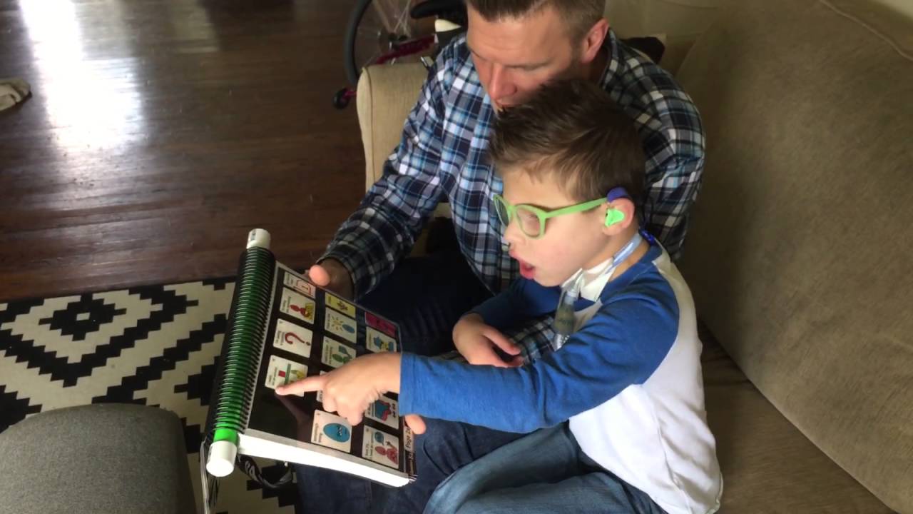 Dad and Jayden talking using PODD