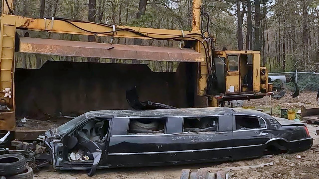 Limousine Crushing cars Limo town car gets folded up and crushed