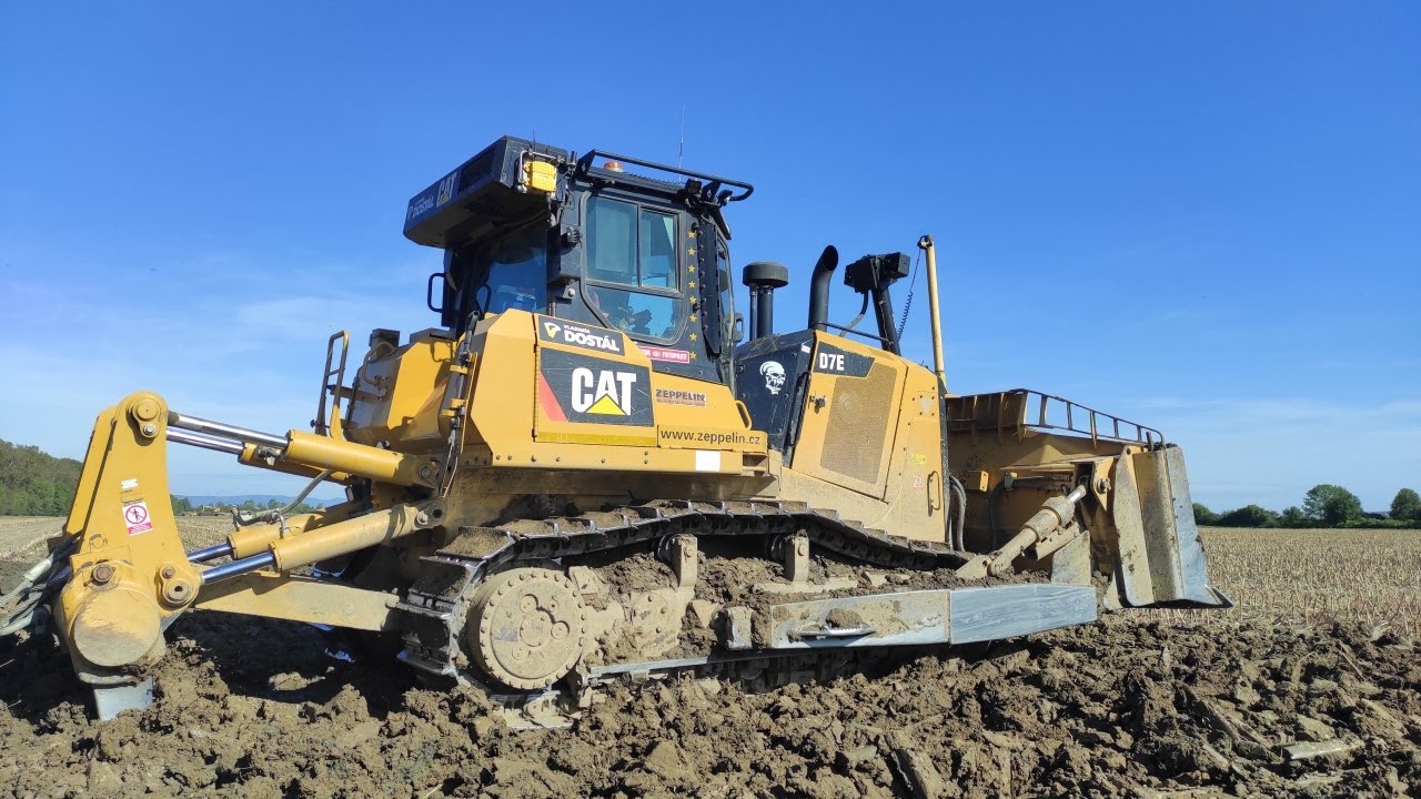 CAT D7E pushing topsoil