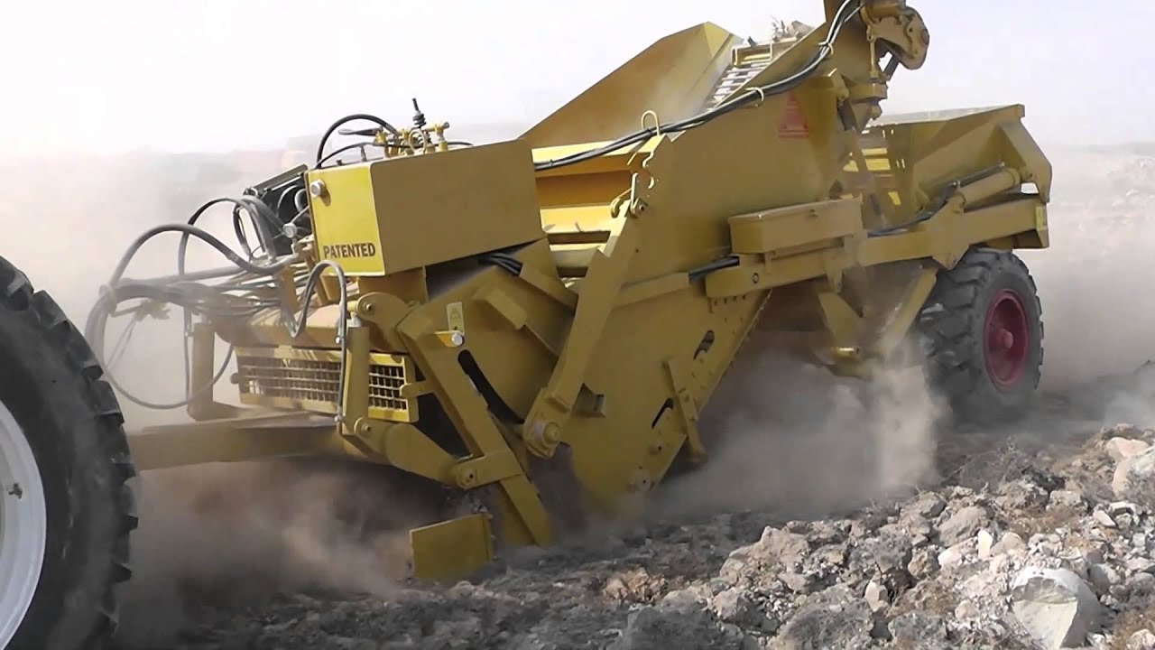Rock Picker DSR-4 working with large rocks in China