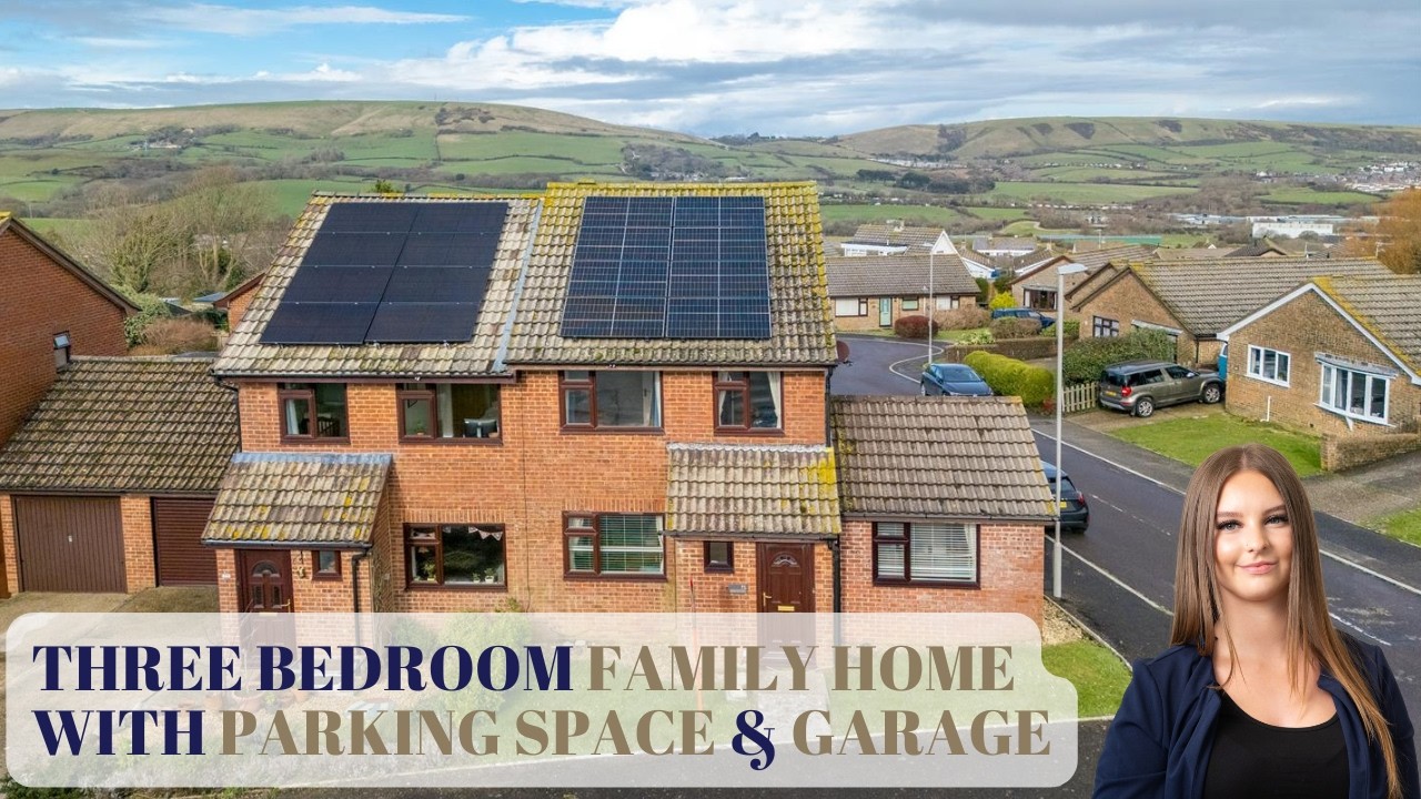 A THREE BEDROOM FAMILY HOME WITH PARKING SPACE AND GARAGE