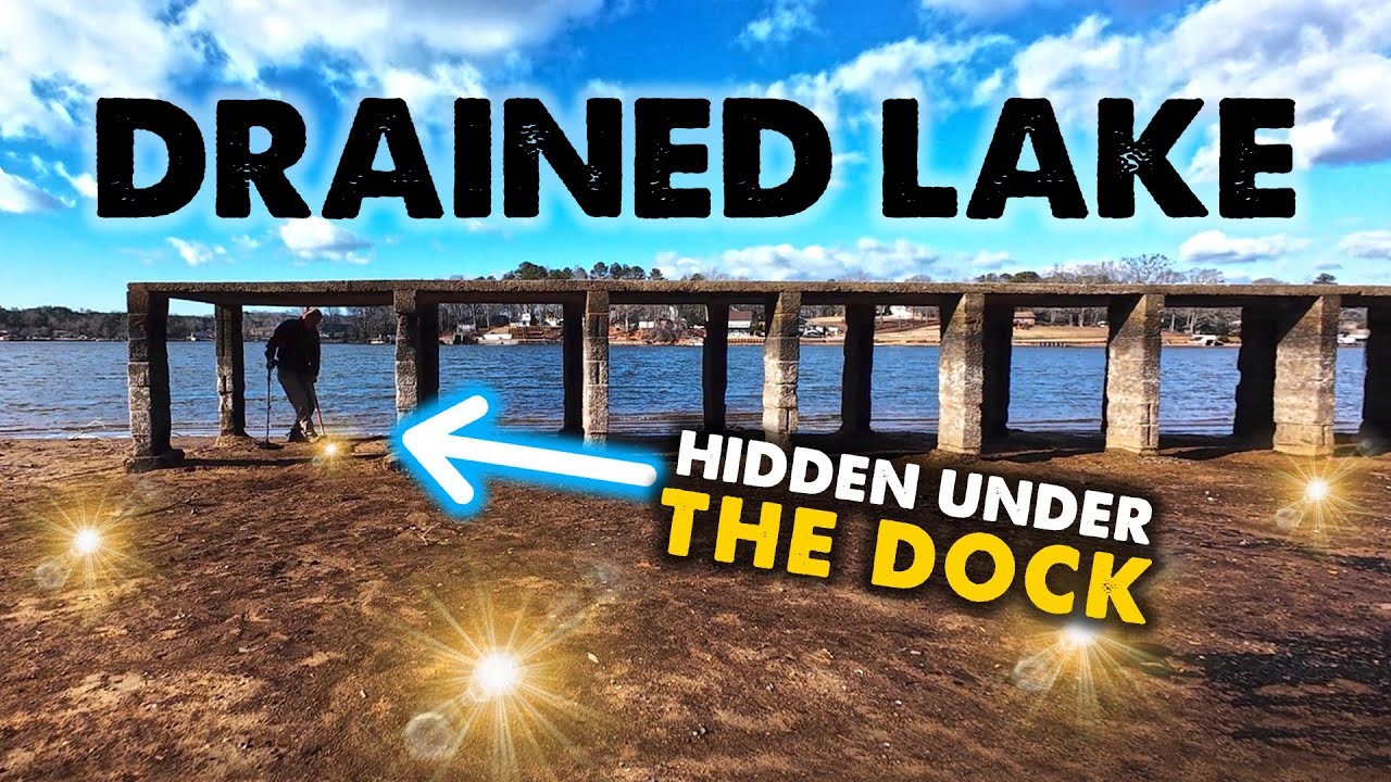 Metal Detecting Old Swimming Hole At Drained Lake! Watch What Was Hidden Under The Dock!