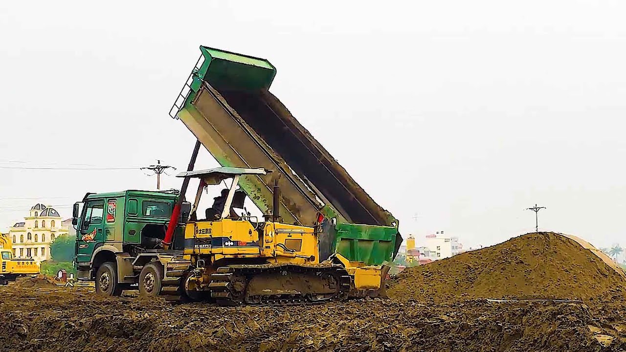 LGZTLG930K wheel loader, roller, bulldozer, and dump truck in operation.