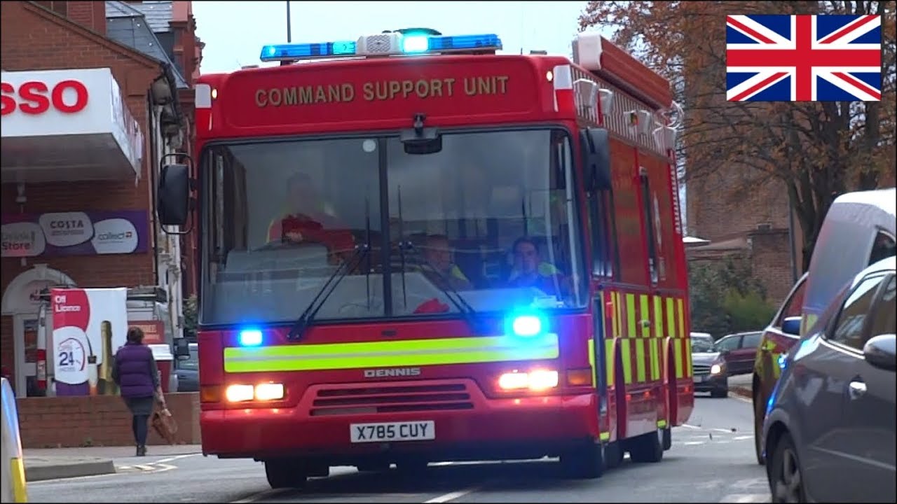 COMMAND UNIT: Bus style fire truck responding with siren and lights