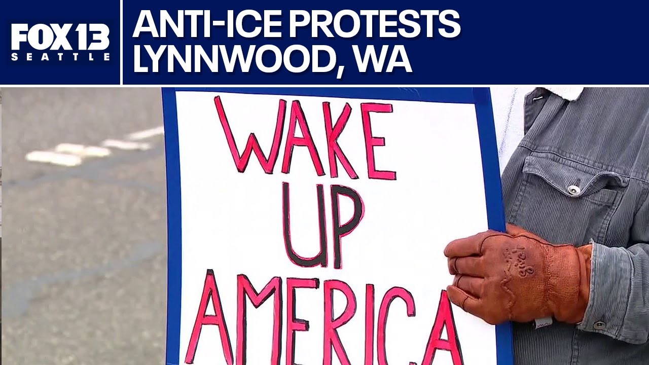 Protesters rally on Highway 99 in Lynnwood, WA calling to abolish ICE