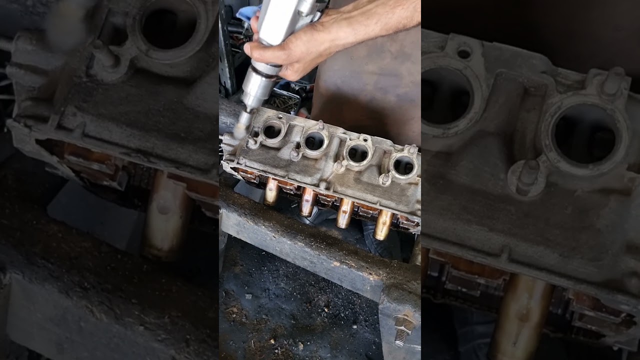 Engine cylinder head cleaning grinder wire brush.