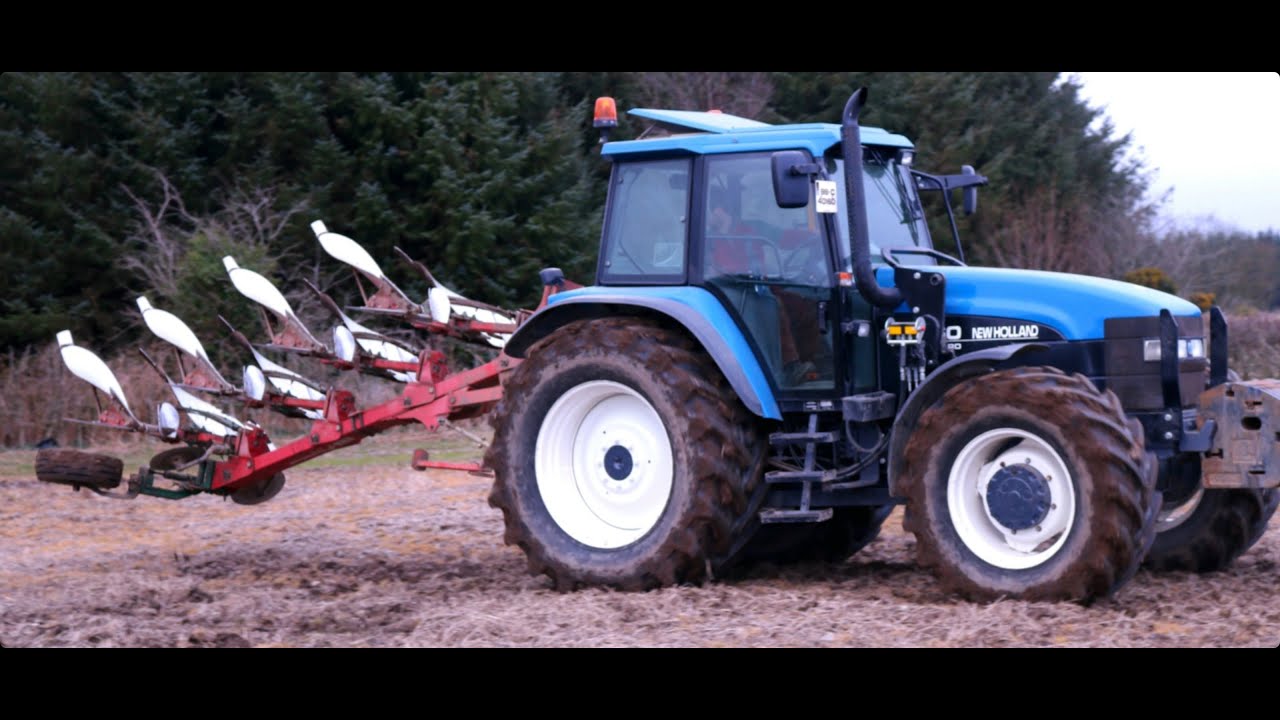 New Holland 8360 ploughing