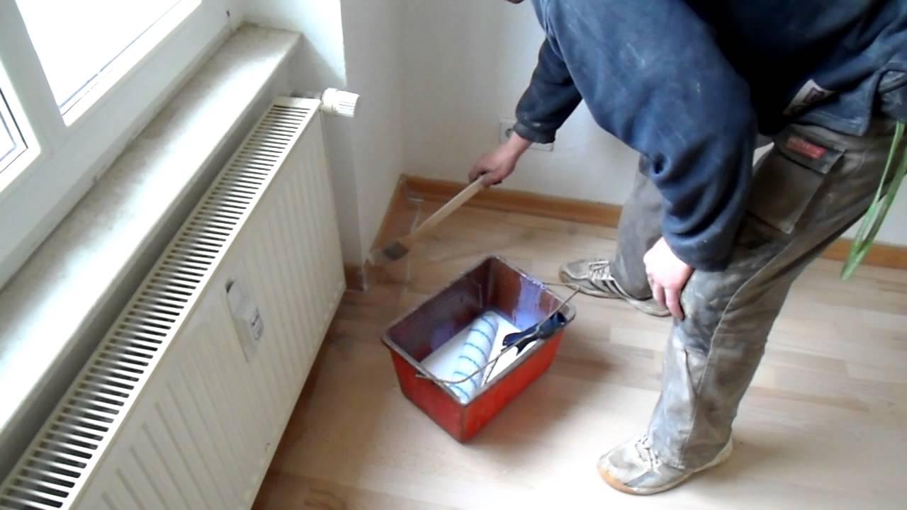 Sanding and sealing industrial parquet