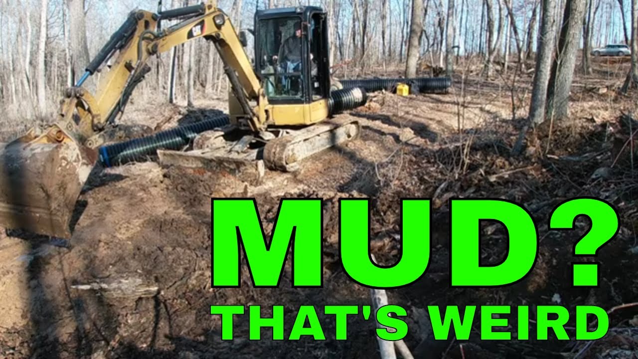 Homeowner installing culverts with Caterpillar 304 mini excavator